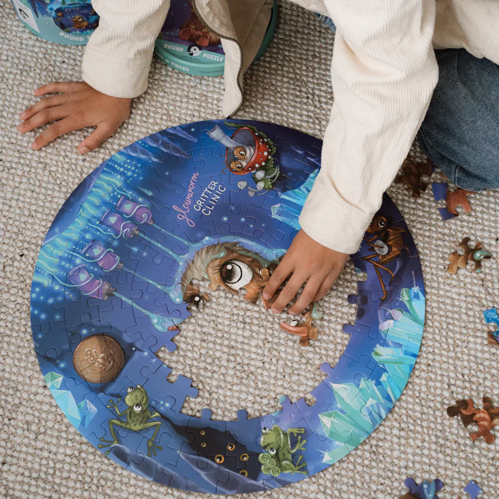 Kuwi the Kiwi Glowworm Glitter Round 100 Piece Puzzle - Image 3