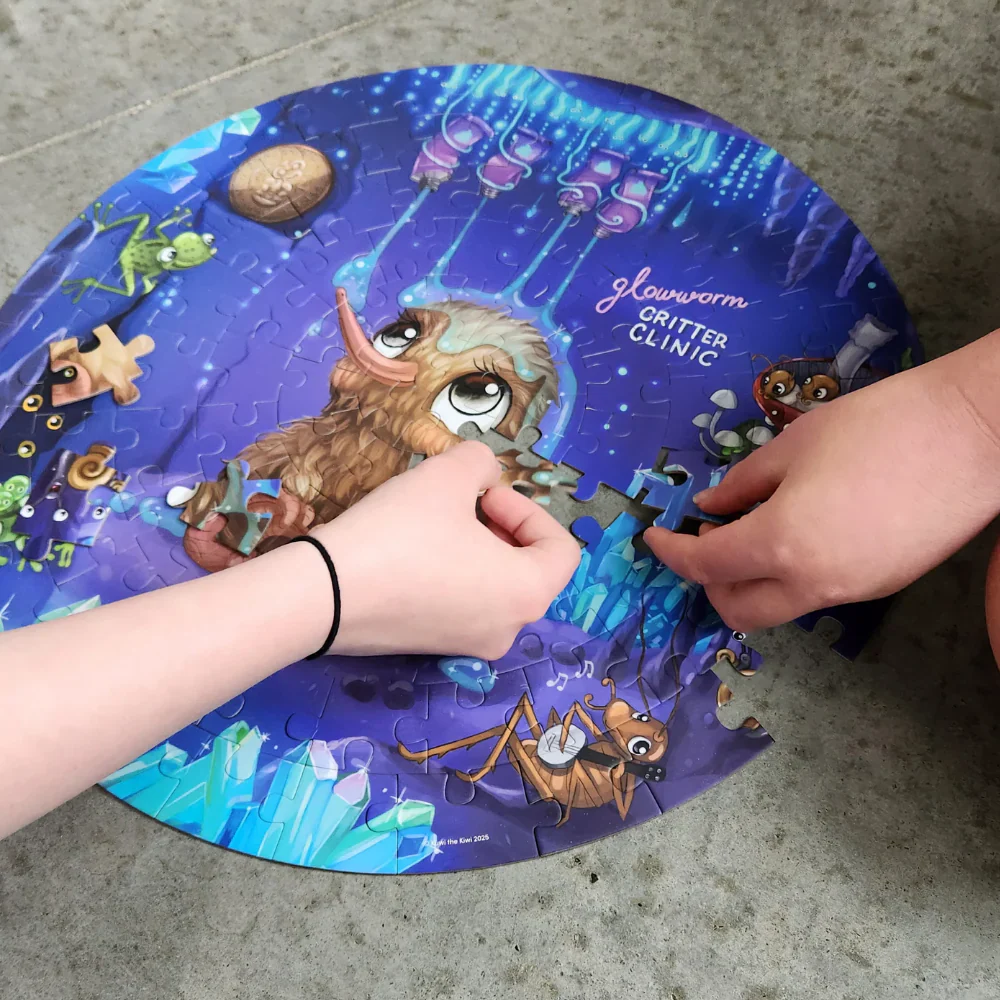 Kuwi the Kiwi Glowworm Glitter Round 100 Piece Puzzle - Image 5